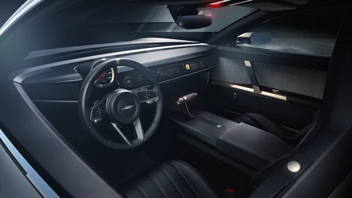 The cabin from the passenger side, showing upholstery and dashboard together